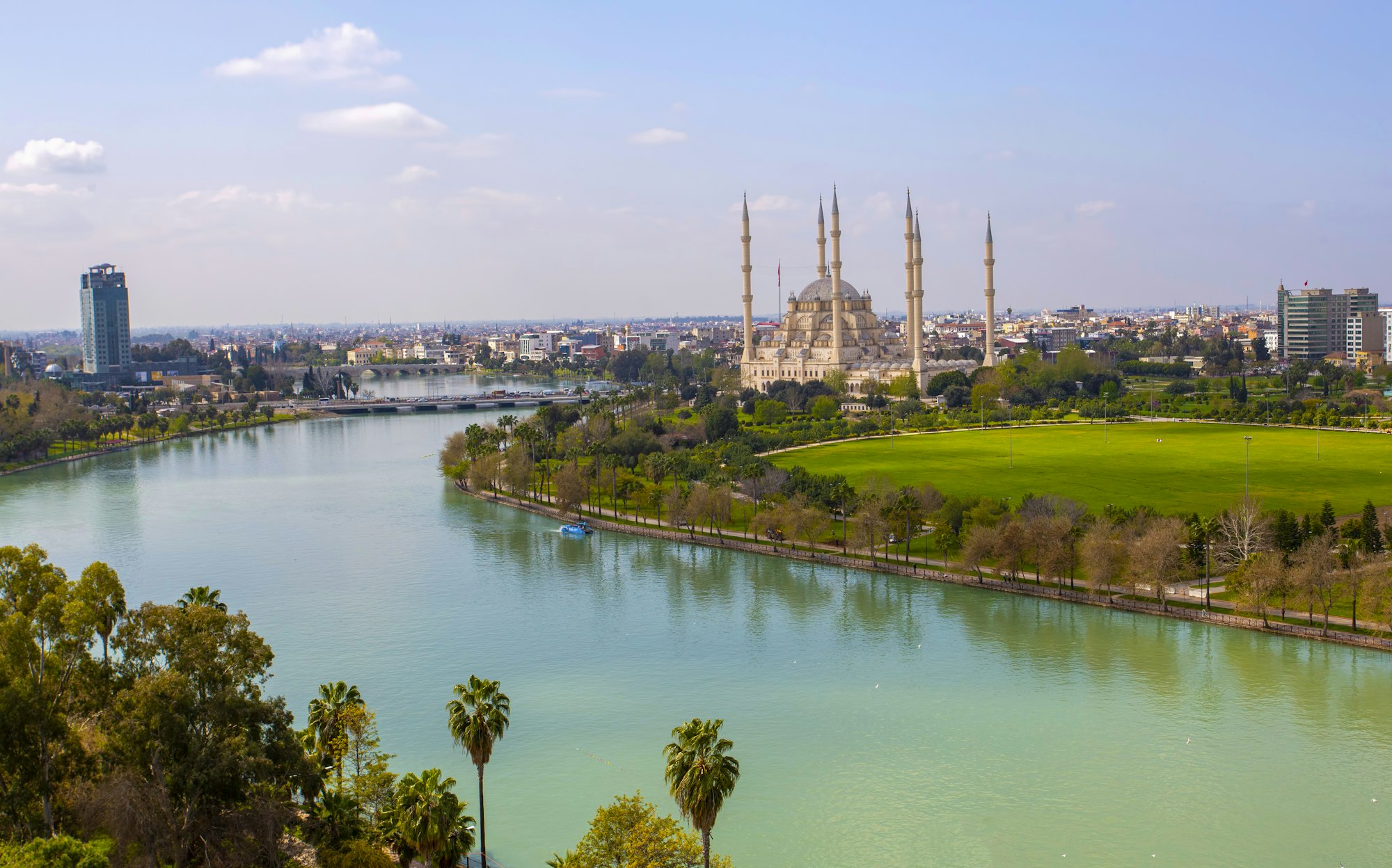 Adana central Sabanci Mosque with Seyhan river, city panoramic and top view, Adana - Turkey.